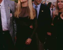 American actress Kim Basinger and her brother, Mick Basinger attend the premiere of 'Batman', held at the Mann Village Theater in Los Angeles, California, 19th June 1989. Mick Basinger is Kim's business manager.  (Photo by Vinnie Zuffante/Getty Images)