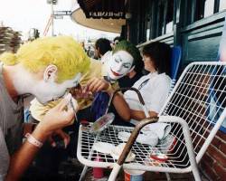 LOS ANGELES, CA - JUNE 19 :  Batman movie fans do their makeup before the Batman movie premiere on June 19, 1989 in Westwood section of Los Angeles, California.  (Photo by Bob Riha, Jr./Getty Images)