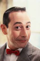 American actor, screenwriter, and producer Paul Reubens is Pee-wee Herman on the set of Pee-wee