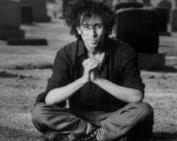 Director/producer Tim Burton sitting in a graveyard.  (Photo by Alan Levenson//Time Life Pictures/Getty Images)