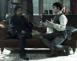 SUNDAY CALENDAR  FOR MARCH 25, 2012. DO NOT USE PRIOR TO PUBLICATION ******************** Director TIM BURTON and JOHNNY DEPP discuss a scene for Warner Bros. Pictures' and Village Roadshow Pictures' movie DARK SHADOWS, a Warner Bros. Pictures release. Photo by Peter Mountain.