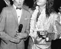 Comic actor Pee-Wee Herman (left) and singer David Lee Roth joking around together at the premiere of the movie 'Pee-Wee's Big Adventure', at Gruman's Chinese Theater in Los Angeles, August 1st 1985. (Photo by Kevin Winter/Getty Images)